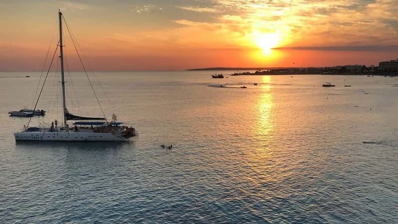 Sunny Beach: Sunset Catamaran Cruise with Dinner & Prosecco - The anchored sunset with prosecco
